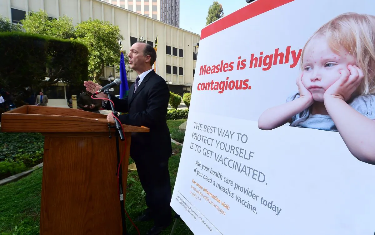 Dr. Jeffrey Gunzenhauser, interim health officer from the Los Angeles County Department of Public Health, briefs the media with a general update of the measles outbreak in Los Angeles County on Feb. 4, 2015. (Frederic J. Brown/AFP/Getty Images)