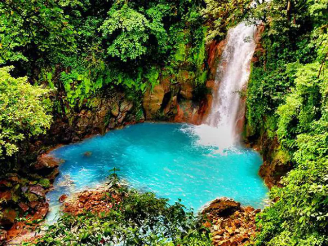 Costa Rica destinations – Rio Celeste waterfall – Photo courtesy of Costa Rica Experts (Traveling Ted)