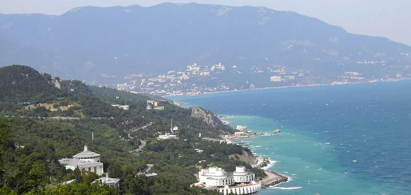 The Crimean Mountains in the background and Yalta as seen from the Tsar's Path - via DDima & Wikipedia Commons
