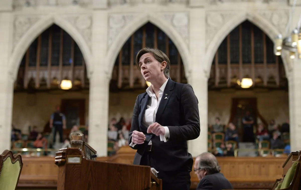 Minister of Labour Kellie Leitch speaks during question period in Parliament on Dec. 5, 2014. Parliament is debating an NDP private member’s bill calling for full Canada Labour Code protections for interns. (The Canadian Press/Adrian Wyld)