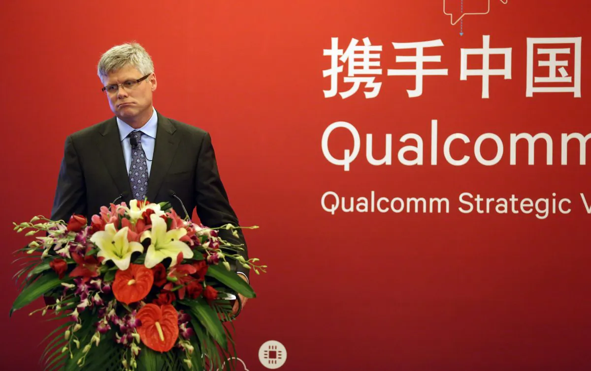 Qualcomm CEO Steve Mollenkopf attends a press conference in Beijing, China on July 24, 2014.
(ChinaFotoPress via Getty Images)