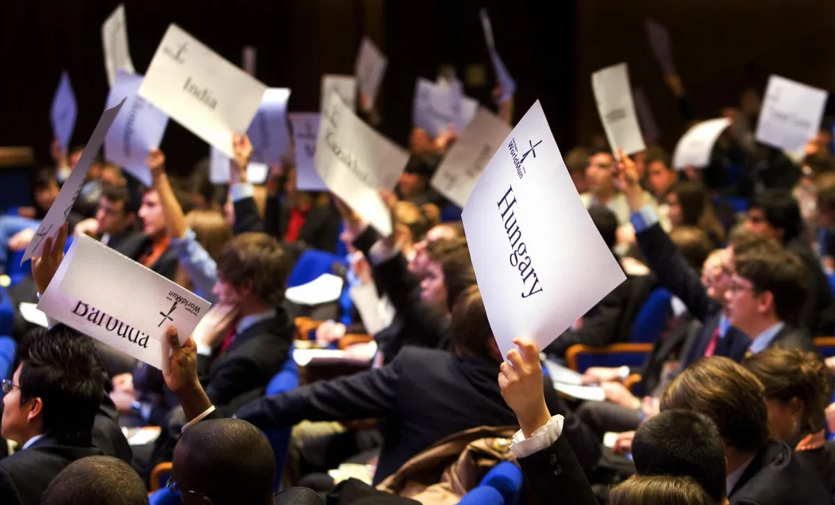 Students vote in one of many committees on the first day of the Harvard World Model United Nations (Harvard WorldMUN) at the World Forum . More than 2,500 students from more than 50 countries are discussing at the World Forum and Peace Palace international matters concerning war, peace, security and human rights. The biggest WorldMUN ever is organized in cooperation with Harvard University and Radboud Universiteit Nijmegen. (ROBIN UTRECHT/AFP/Getty Images) 
