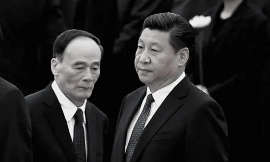China’s Wang Warns About Nation’s Economy Taking the ‘Wrong Road’
