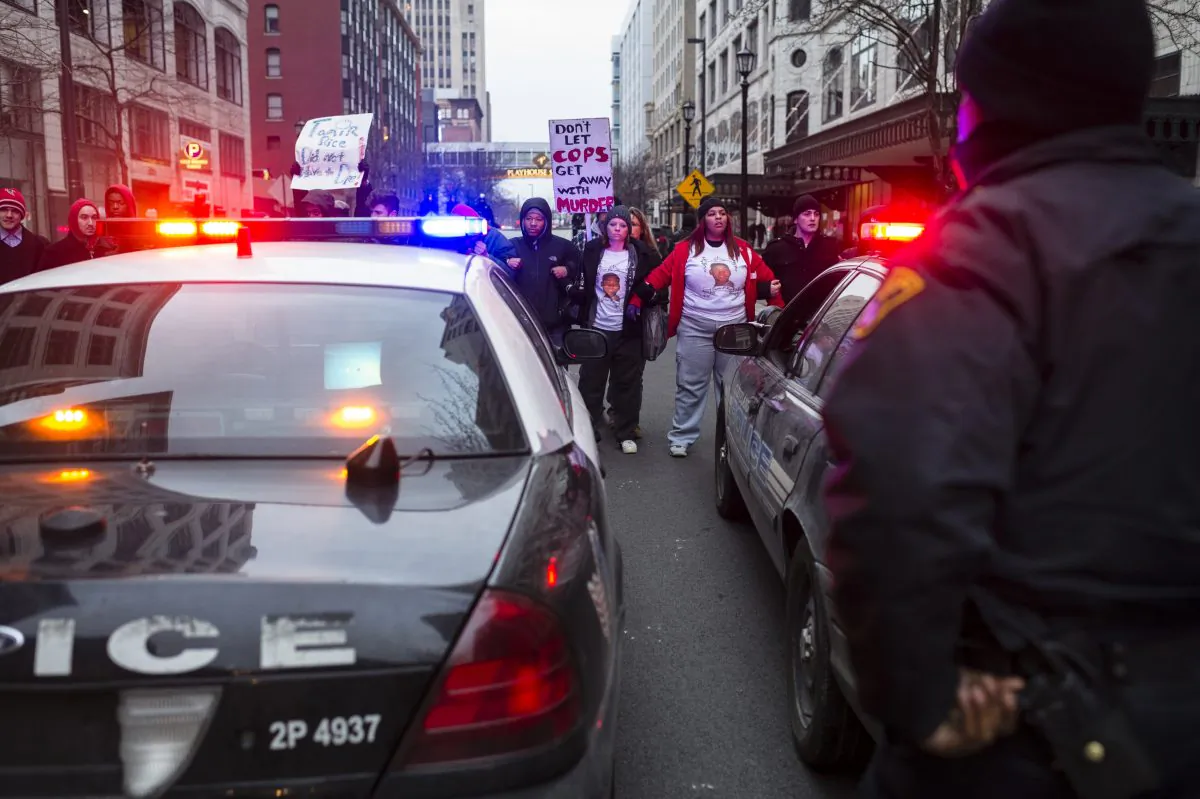 Demonstrators from Ferguson travelled to Cleveland to unite with activists protesting the death of Tamir Rice. (Angelo Merendino/Getty Images)