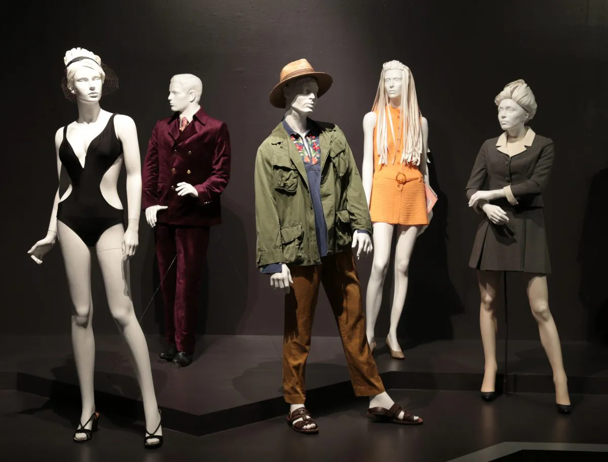 “Inherent Vice” costumes designed by Mark Bridges. Costumes worn by actors: (L - R) Serena Scott Thomas as Sloane Wolfmann, Martin Short as Dr. Rudy Blatnoyd, Joaquin Phoenix as Larry “Doc” Sportello, Shasta Fay Hepworth as Katherine Waterston, Reese Witherspoon as Deputy D.A. Penny Kimball. (Photo: Alex J. Berliner/ABImages)
