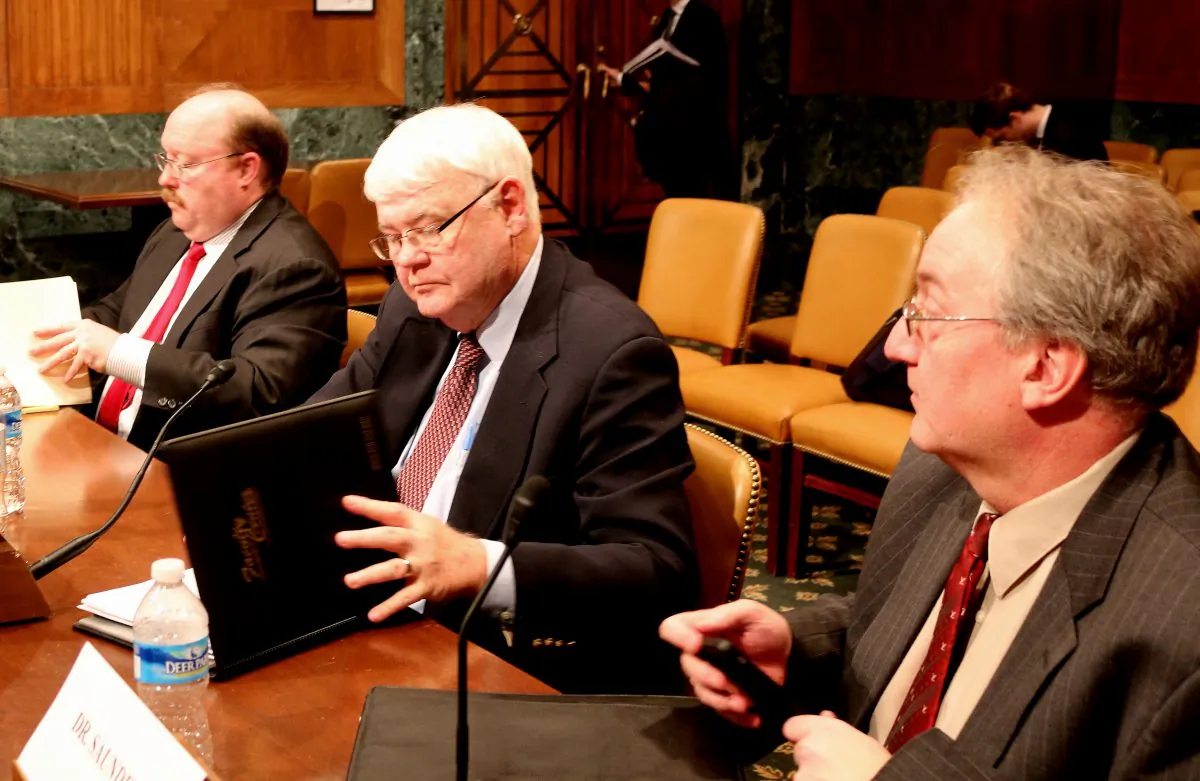 Three China experts testify before the U.S.-China Economic and Security Review Commission on Feb. 18. (L to R) Richard D. Fisher, Jr., senior fellow, Asian Military Affairs, International Assessment and Strategy Center, Alexandria, Va.; Dr. Roger Handberg, Department of Political Science, University of Central Florida, Orlando, Fla.; and Dr. Phillip Saunders, distinguished research fellow, National Defense University, Washington, D.C. (Gary Feuerberg/ Epoch Times)