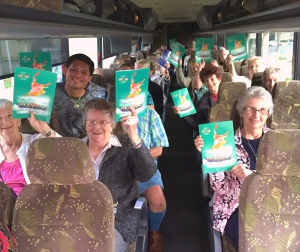 50 seniors on a bus tour from the Hemet area of Southern California show off their Shen Yun programs after attending the performance at the California Center for the Arts in Escondido, Calif. on Chinese New Year, Feb. 19. (Jane Yang/Epoch Times)
