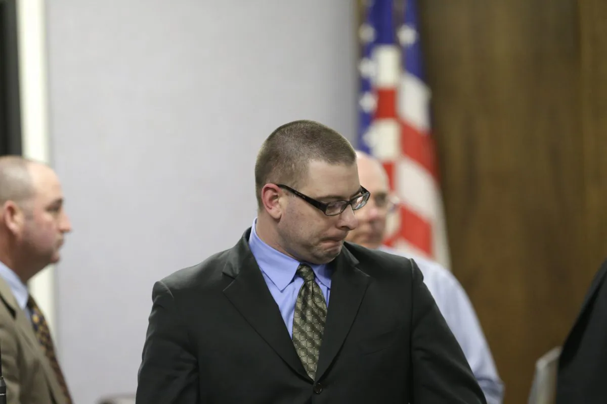 Eddie Ray Routh walks to his seat in court after a break during his capital murder trial at the Erath County, Donald R. Jones Justice Center Friday, on Feb. 20, 2015, in Stephenville, Texas. (AP Photo/LM Otero)