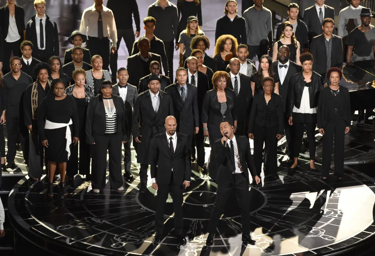 Common, foreground left, and John Legend, foreground right, perform the theme song from the film, [i]Selma[/i], "Glory," at the Oscars ceremony on Sunday, Feb. 22, 2015, at the Dolby Theatre in Los Angeles. The duo won the award for Best Original Song Sunday. (Photo by John Shearer/Invision/AP)