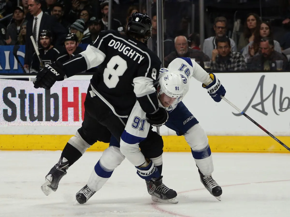 Drew Doughty holds up Steven Stamkos at the Staples Center on Feb. 16, 2015 in Los Angeles. The Kings defensemen shines in enhanced stats, but is less convinced of their usefulness. (Bruce Bennett/Getty Images)