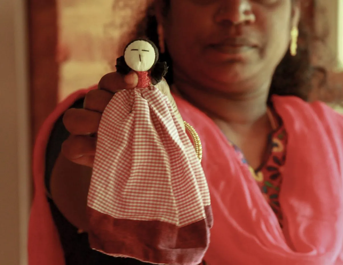 A woman and her Tsunamika doll at the Upasana Integral Design studio in Auroville, India on Jan. 27, 2015. (Venus Upadhayaya/Epoch Times)