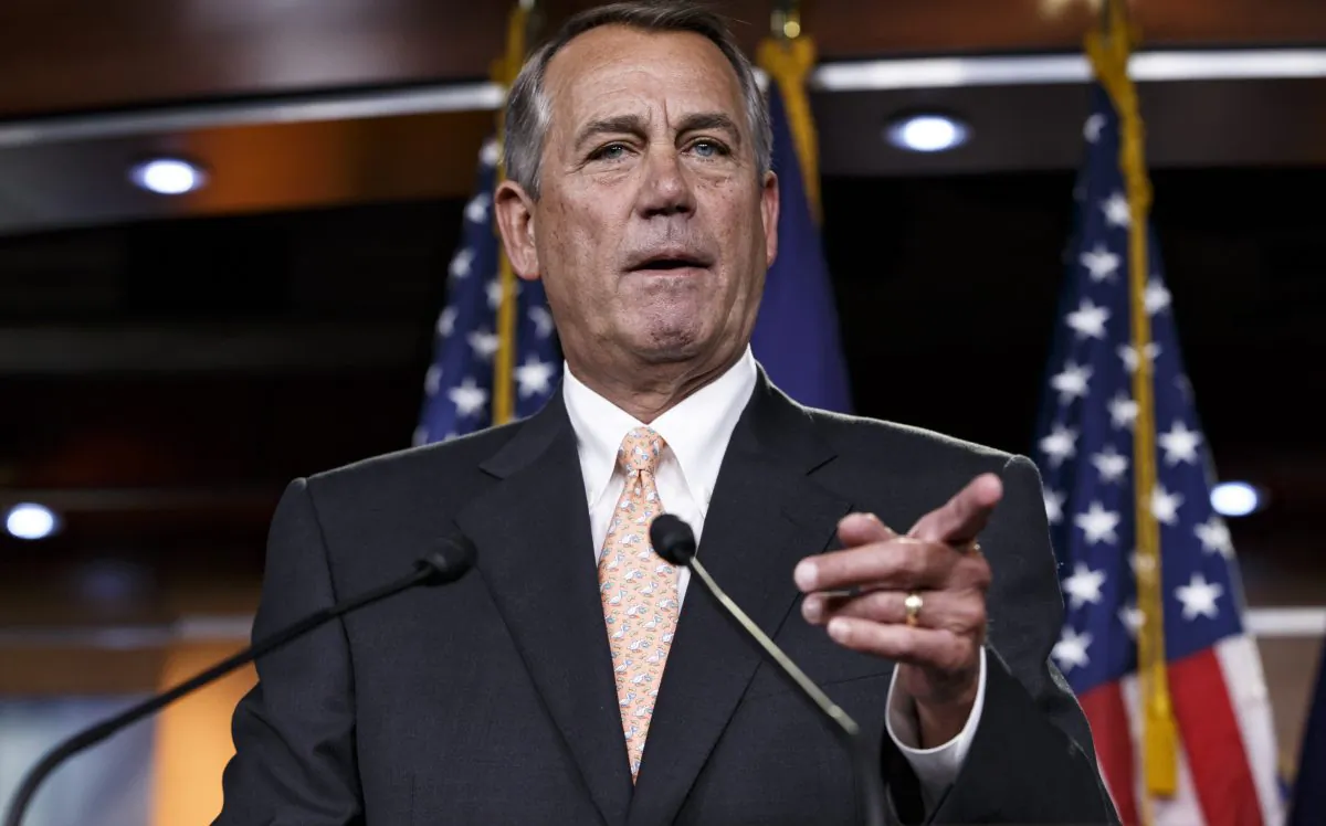 House Speaker John Boehner of Ohio responds to reporters about the problems in passing the Homeland Security budget because of Republican efforts to block President Barack Obama's executive actions on immigration, Feb. 26, 2015. (AP Photo/J. Scott Applewhite)