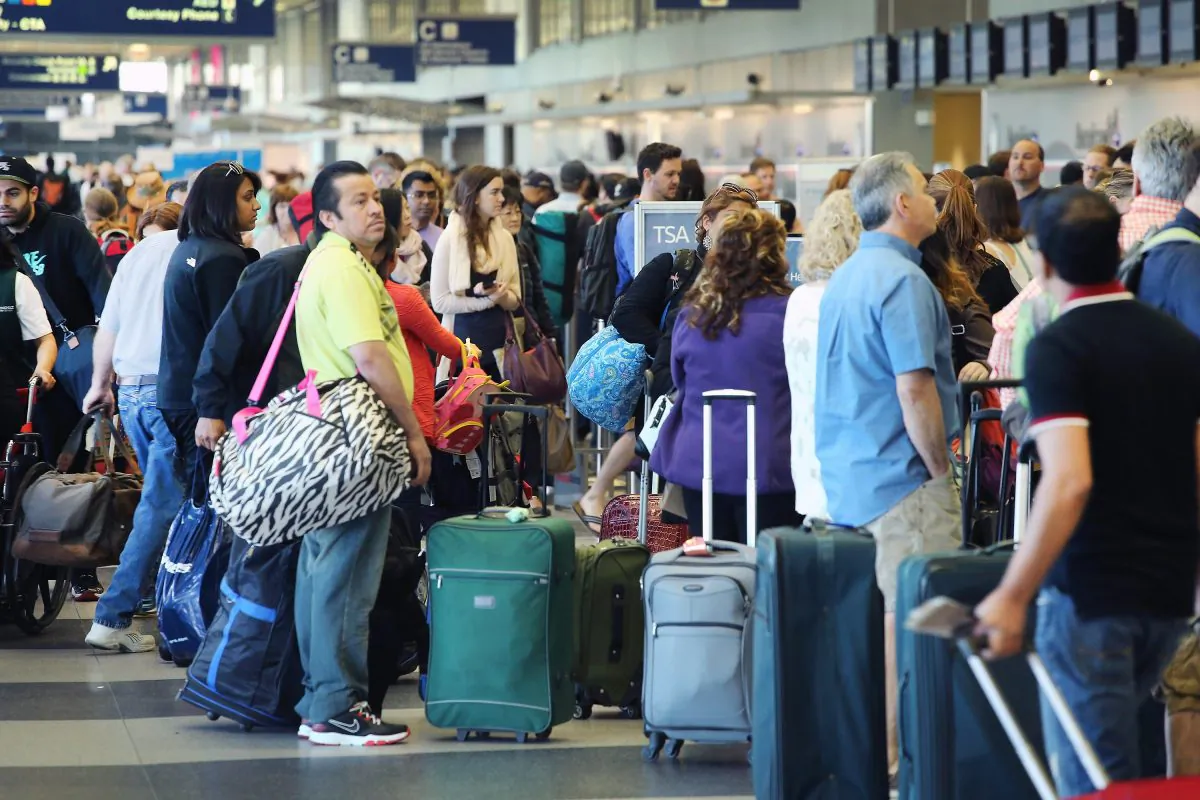Passengers wait in line at a security checkpoint at Chicago's O'Hare Airport on May 23, 2014. (Scott Olson/Getty Images)