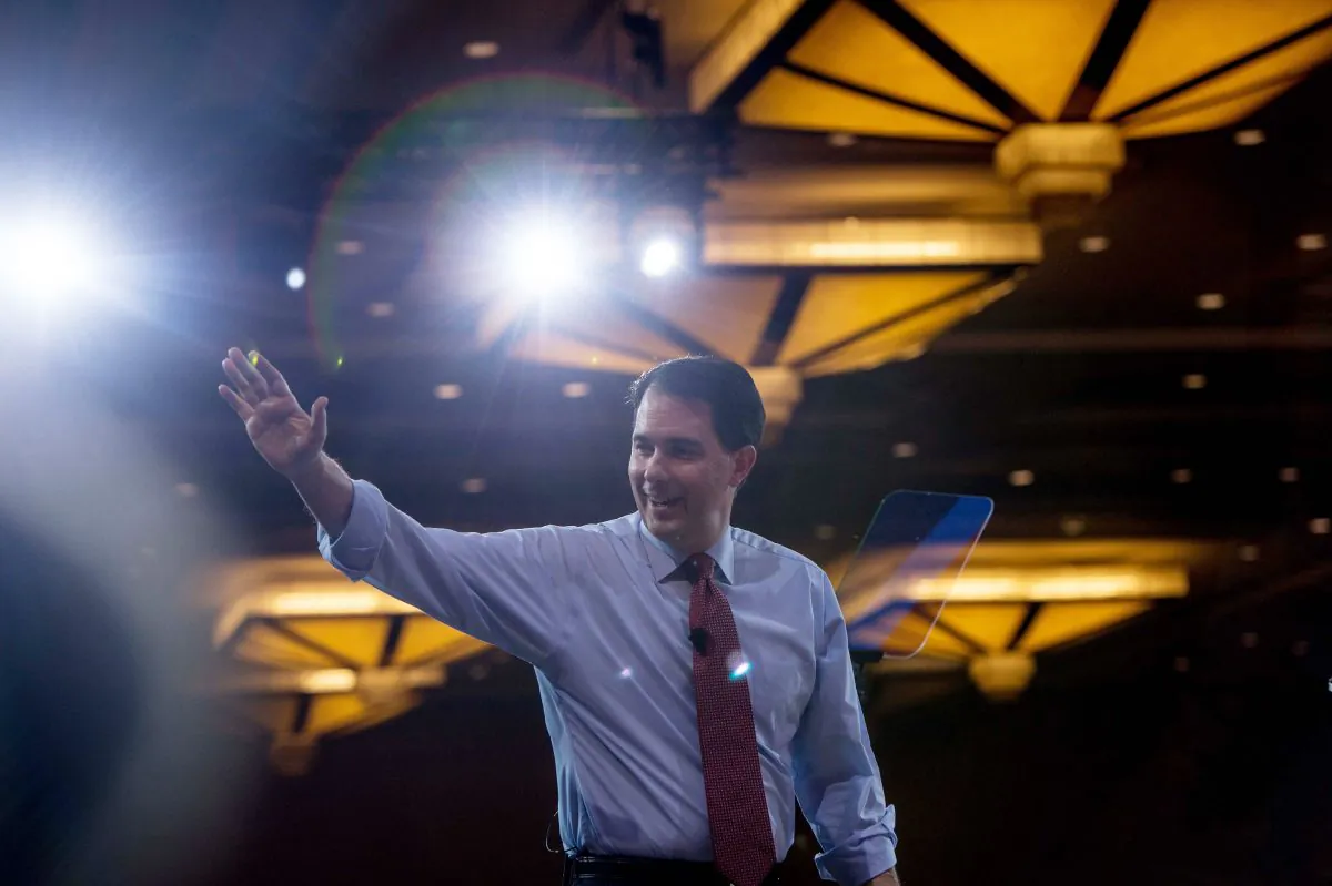 Wisconsin Governor Scott Walker walks off stage after speaking at the annual Conservative Political Action Conference (CPAC) at National Harbor, Maryland, outside Washington, DC on February 26, 2015. (Nicholas Kamm/AFP/Getty Images)
