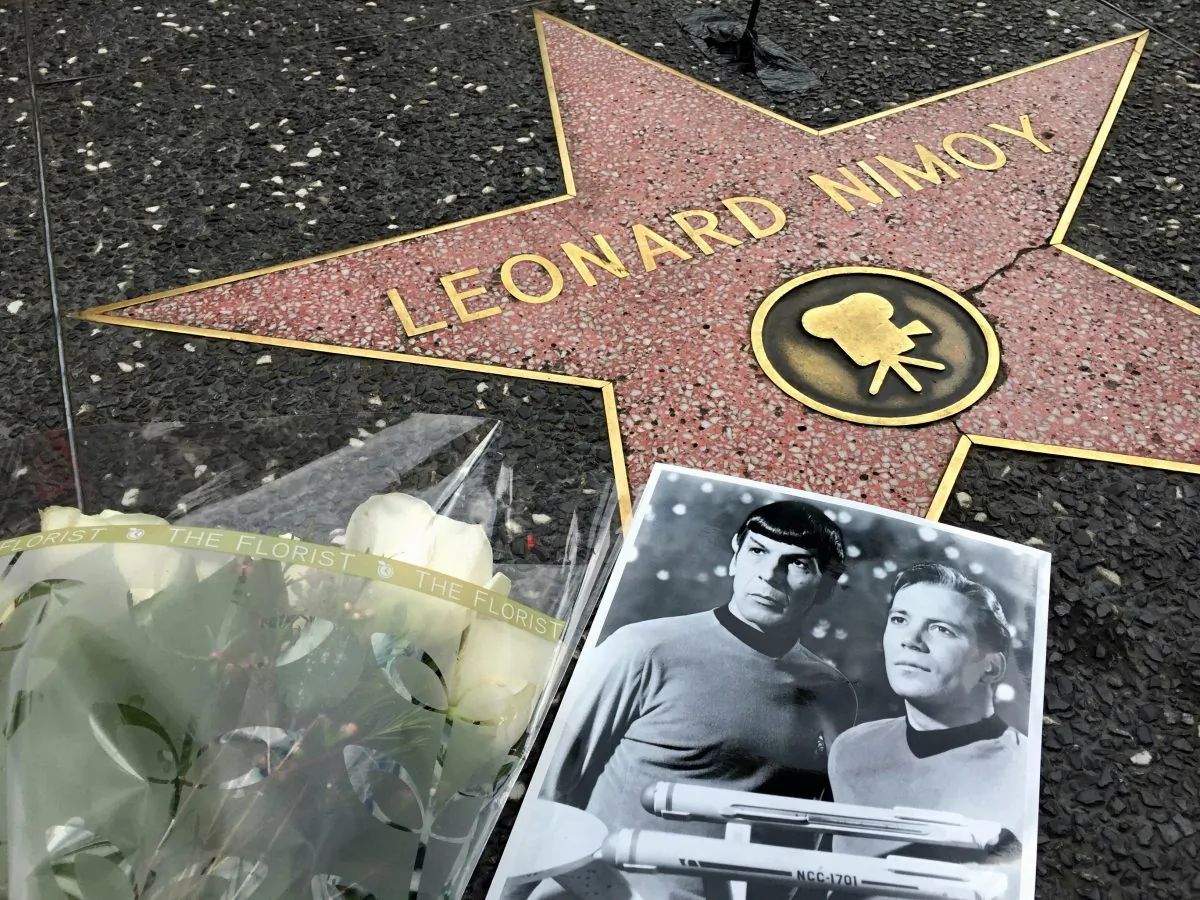 Flowers adorn the Hollywood Walk of Fame star of Leonard Nimoy in Los Angeles Friday, Feb. 27, 2015. Nimoy, famous for playing officer Mr. Spock in Star Trek died Friday, Feb. 27, 2015 in Los Angeles of end-stage chronic obstructive pulmonary disease. He was 83. (AP Photo/Damian Dovarganes)