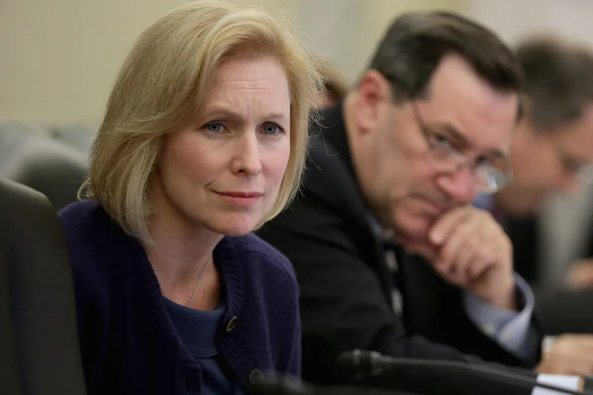 Senate Agriculture Committee member Sen. Kristen Gillibrand (D-N.Y.) and Sen. Joe Donnelly (D-Ind.) listen to testimony in Washington, D.C., May 13, 2014. The committee heard from witnesses about high frequency and AUTOMATED TRADING in the futures markets. (Chip Somodevilla/Getty Images)
