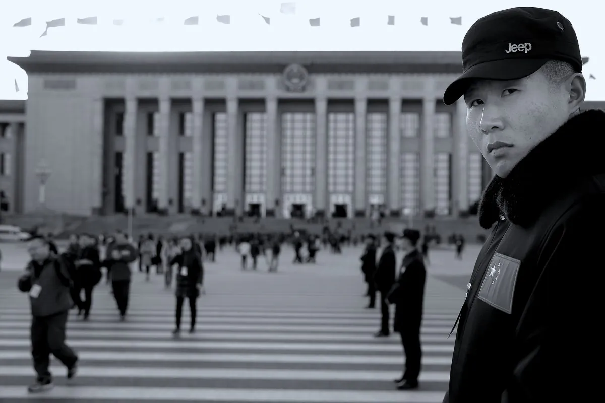 A plainclothes policeman guards outside Great Hall of the People after the opening session of the Chinese People's Political Consultative Conference (CPPCC) in Beijing on March 3, 2015. (Lintao Zhang/Getty Images)