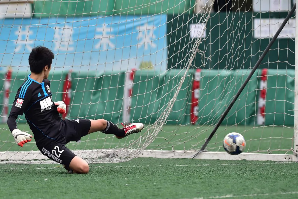 HKFC score to go 1-0 in their 5-2 win against Wan Chai in the HKFA first division match at Valley-6 on Sunday March 1, 2015. (Bill Cox/Epoch Times)