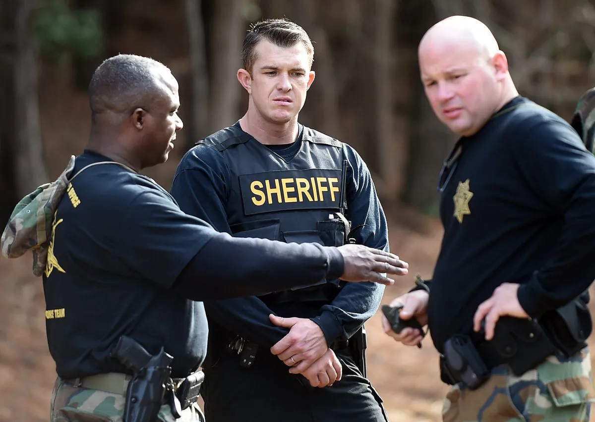 Wilson County Sheriff's Deputies investigate an area near Interstate 95, Monday, March 2, 2015, in Wilson, N.C. (AP Photo/The Wilson Times, Brad Coville)