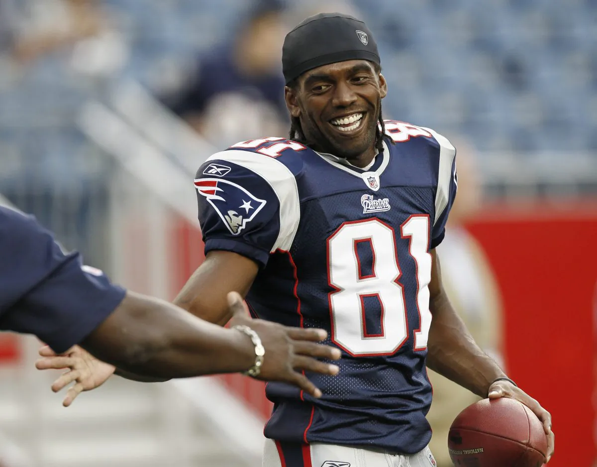 New England Patriots' Randy Moss caught an NFL record 23 TD passes in his first season with the Patriots. (AP Photo/Winslow Townson)