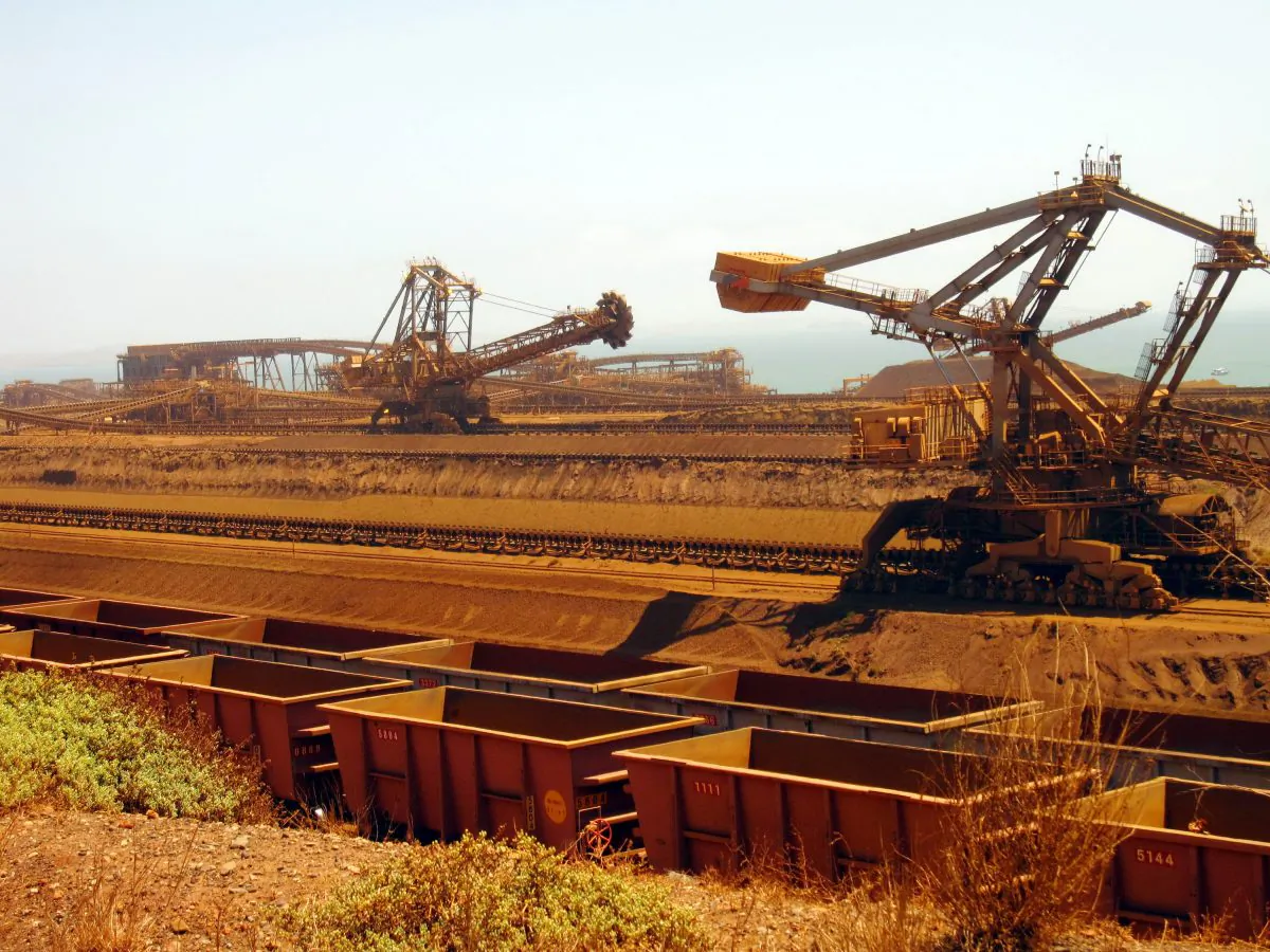 Stackers and reclaimers move iron ore to rail cars at Rio Tinto's Port Dampier operations in Western Australia's Pilbara region. (Amy Coopes/AFP/Getty Images)