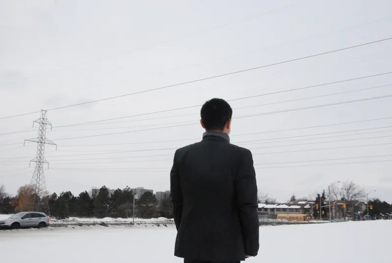 “Mr. Wang” (an alias) stands for a photograph in Toronto, Canada, recently. As an intern doctor in China in the 1990s, Mr. Wang said he witnessed the harvesting of organs from a living person. (Yi Ling/Epoch Times)