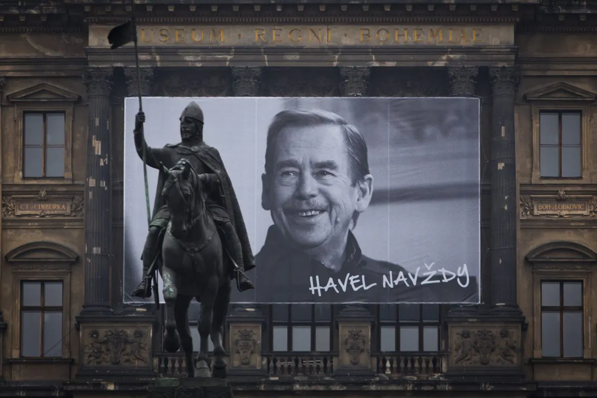 A large portrait of former President of Czechoslovakia and Czech Republic Vaclav Havel with the sign "Havel Forever" hangs on the National Museum behind the St. Wenceslas statue on the 25th anniversary of the Velvet Revolution in Prague, Czech Republic, on Nov. 17, 2014. (Matej Divizna/Getty Images)