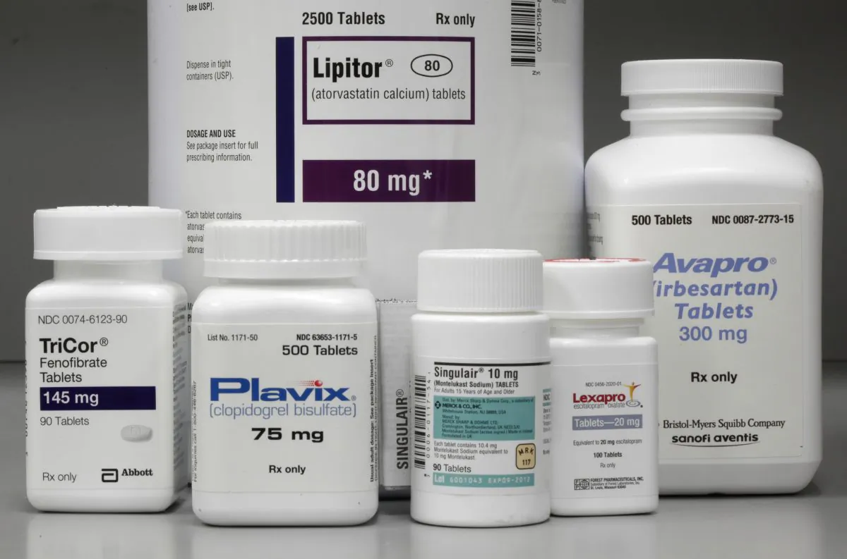 Bottles of prescription drugs—Lipitor, TriCor, Plavix, Singulair, Lexapro, and Avapro—are displayed at Medco Health Solutions Inc., in Willingboro, N.J., on June 14, 2011. (AP Photo/Matt Rourke)