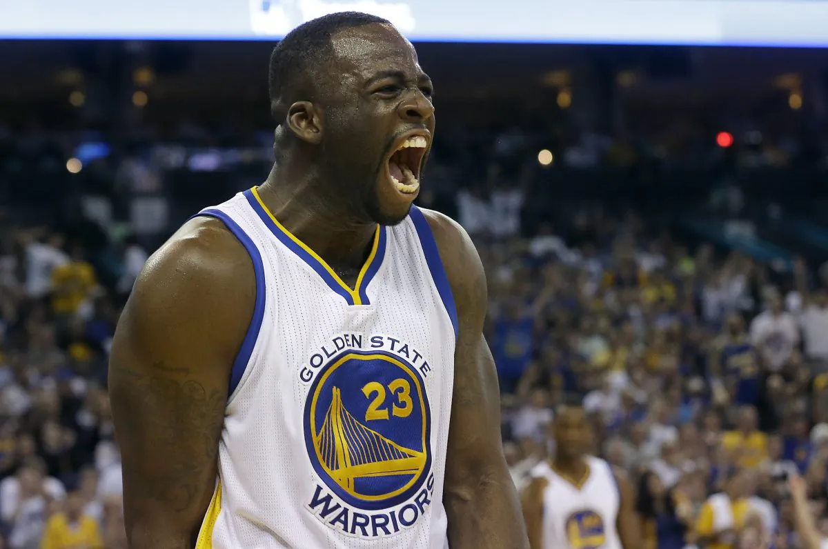 Golden State Warriors forward Draymond Green (23) yells after scoring against the Los Angeles Clippers during the second half of an NBA basketball game in Oakland, Calif., Sunday, March 8, 2015. (AP Photo/Jeff Chiu)