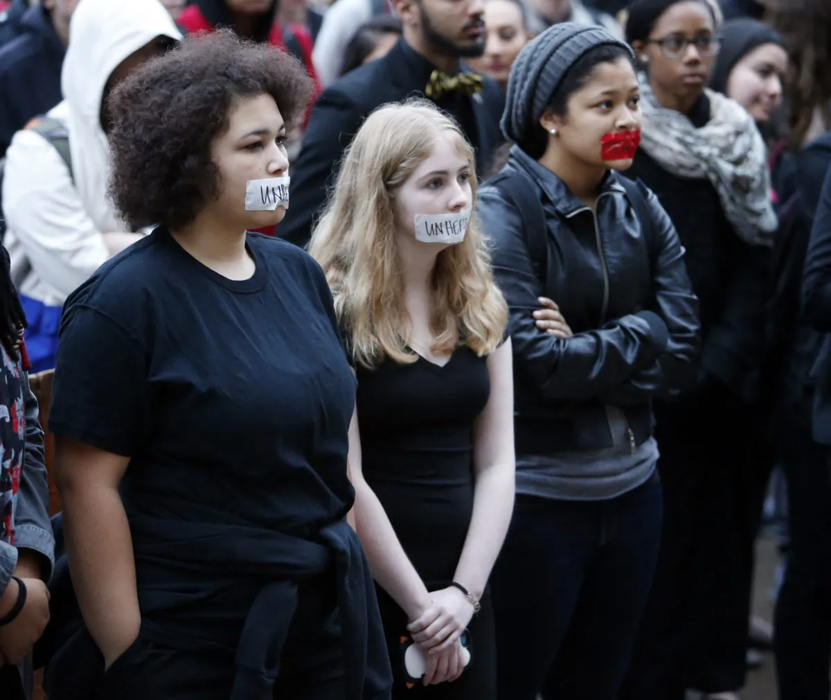 Students at the University of Oklahoma protest racist comments made by the Sigma Alpha Epsilon fraternity on campus, on Monday, March 9, 2015 in Norman, Okla. University President David Boren ordered the fraternity's house to be vacated by midnight Tuesday. (AP Photo/The Oklahoman, Steve Sisney)