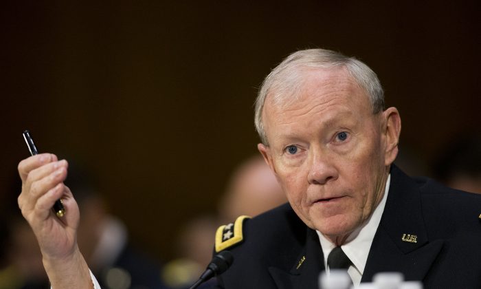 Joint Chief Chairman Gen. Martin Dempsey testifies on Capitol Hill in Washington, Wednesday, March 11, 2015, before the Senate Foreign Relation Committee. Three of America's top national security officials face questions on Capitol Hill about new war powers being drafted to fight Islamic State militants, Iran's sphere of influence and hotspots across the Mideast. (AP Photo/Pablo Martinez Monsivais)