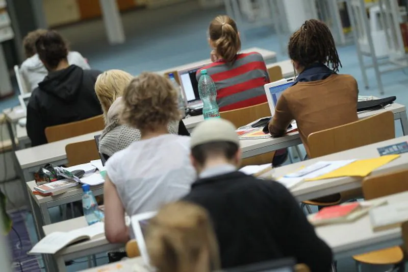 Students study with their laptop computers in the Pedagogical Library at the Freie Universitaet university on September 20, 2011 in Berlin, Germany. (Sean Gallup/Getty Images)
