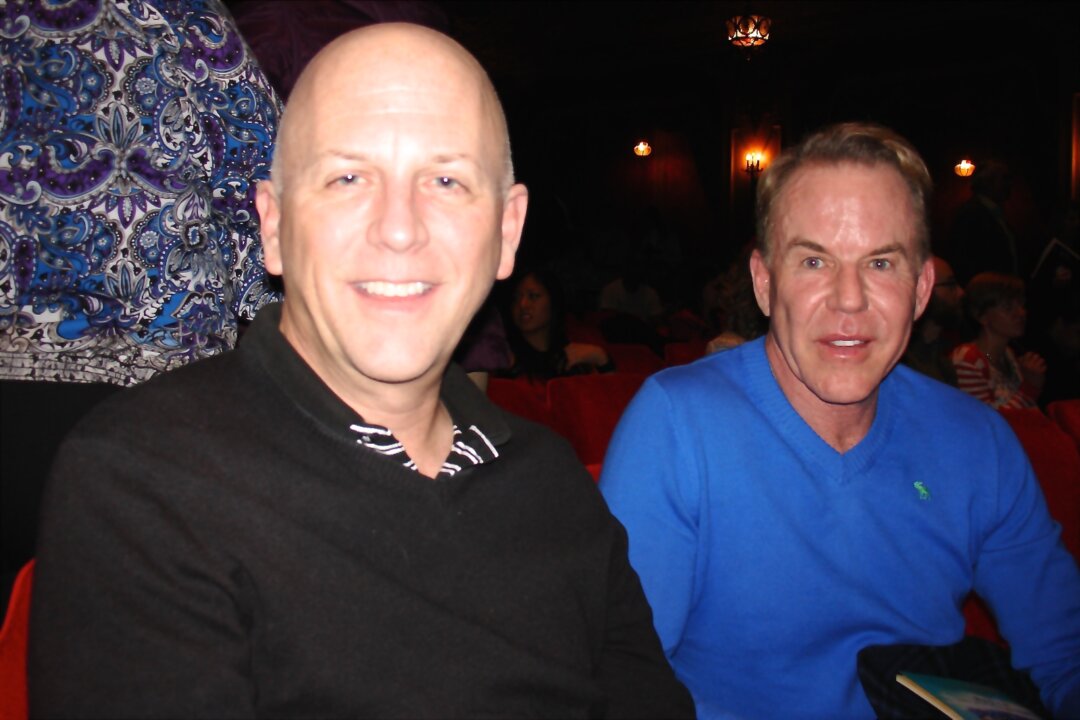 Jeff Stewart (L) and Cary Kenner attend Shen Yun Performing Arts at Columbus' Ohio Theatre, on March 11, 2015. (Ying Wan/Epoch Times) 