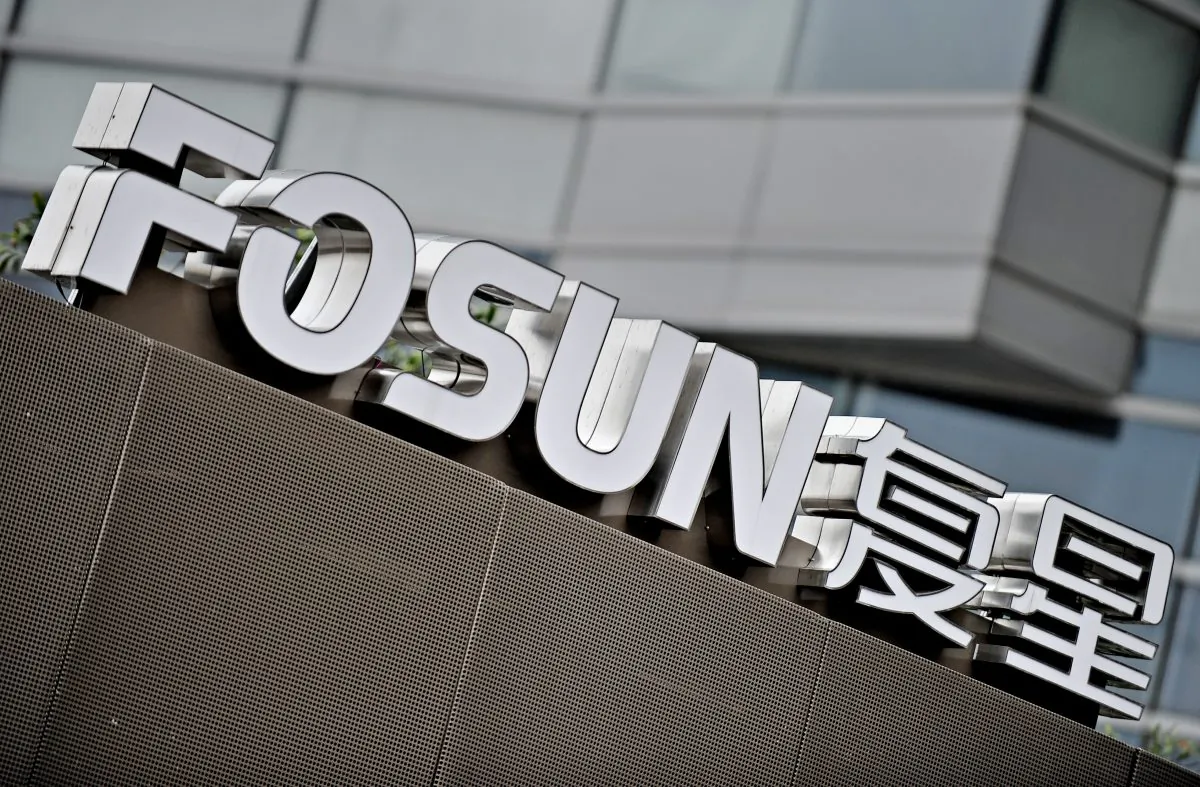 The logo of Fosun International in front of the company's headquarters in Shanghai. (Philippe Lopez/AFP/Getty Images)