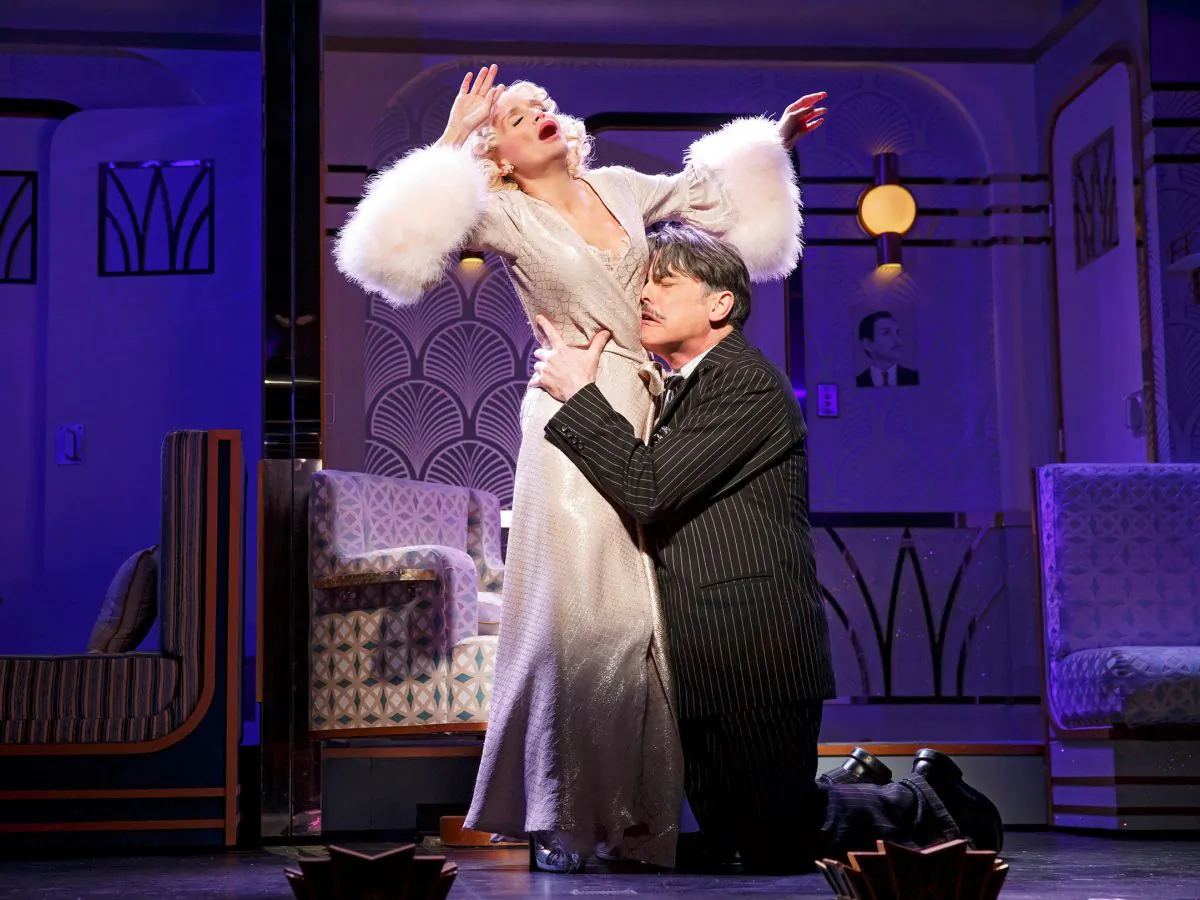 Producer Oscar Jaffee (Peter Gallagher) desperately needs star Lily Garland (Kristen Chenowith) to appear in his new production, in the wonderful musical “On the Twentieth Century.” (Joan Marcus)
