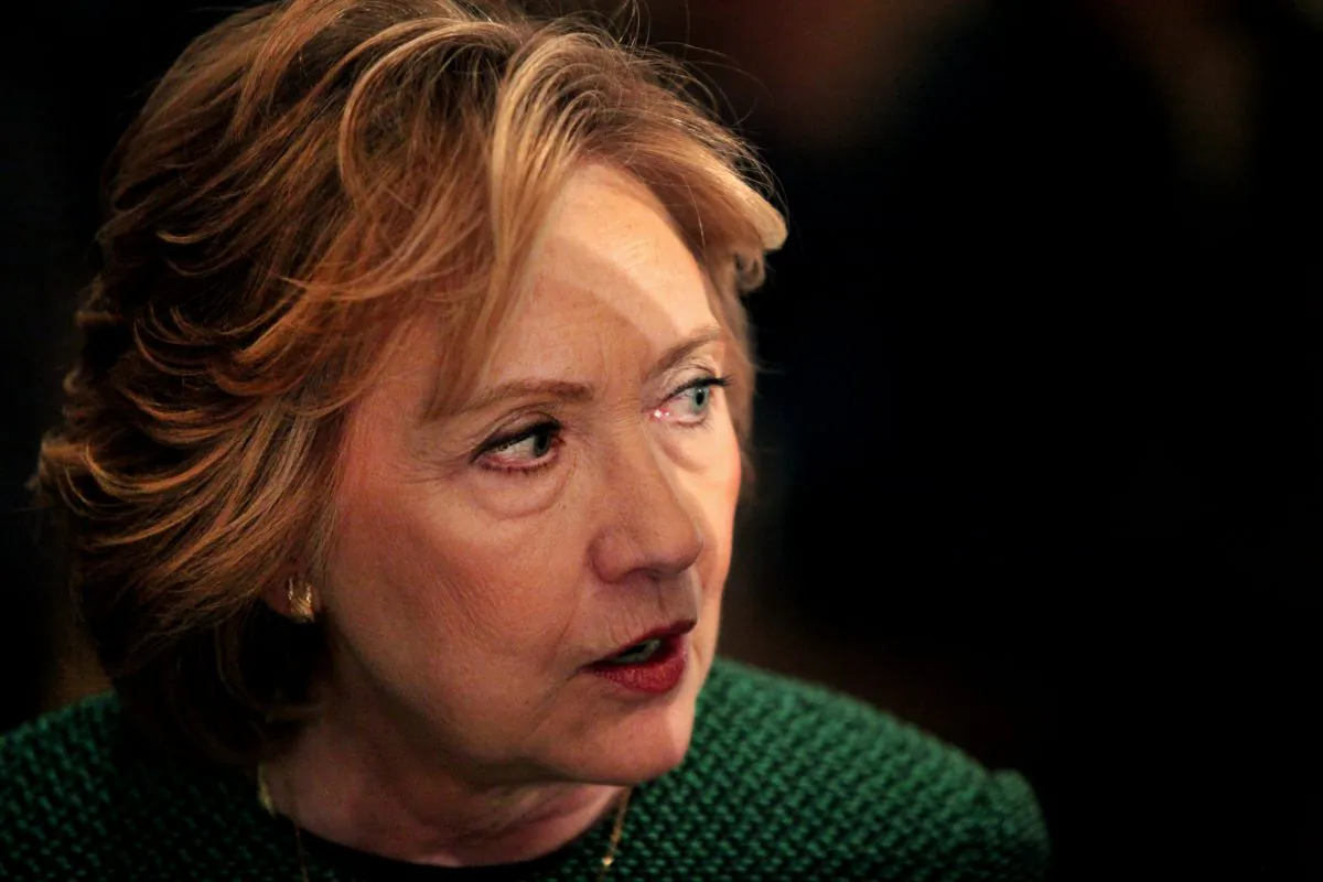 Former Secretary of State Hillary Clinton chats with those around her during a ceremony to induct her into the Irish America Hall of Fame on March 16, 2015 in New York City. (Yana Paskova/Getty Images)