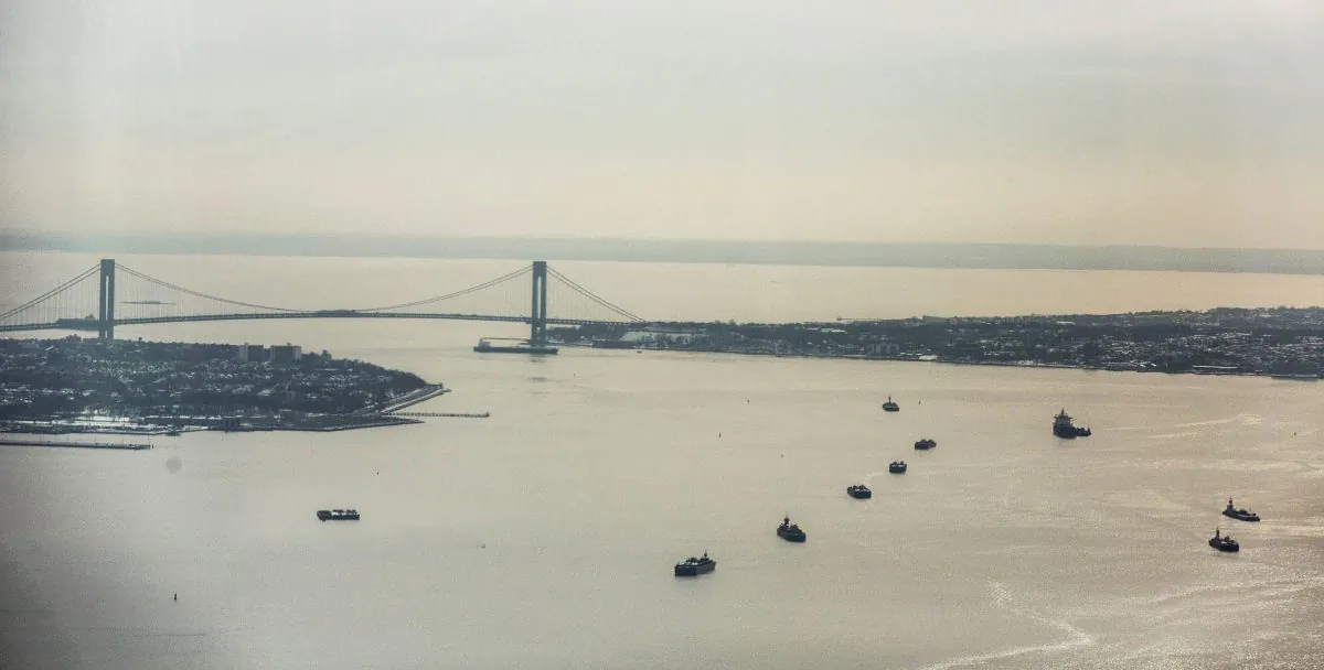 The Verrazano-Narrows Bridge and New York Harbour are seen from the 100th floor of One World Trade Center on February 12, 2014 in New York City. The Harlem Globetrotters toured the 100th floor of the World Trade Center and gave away 104 tickets to an upcoming show, to represent the 104 floors of the building. (Photo by Andrew Burton/Getty Images)