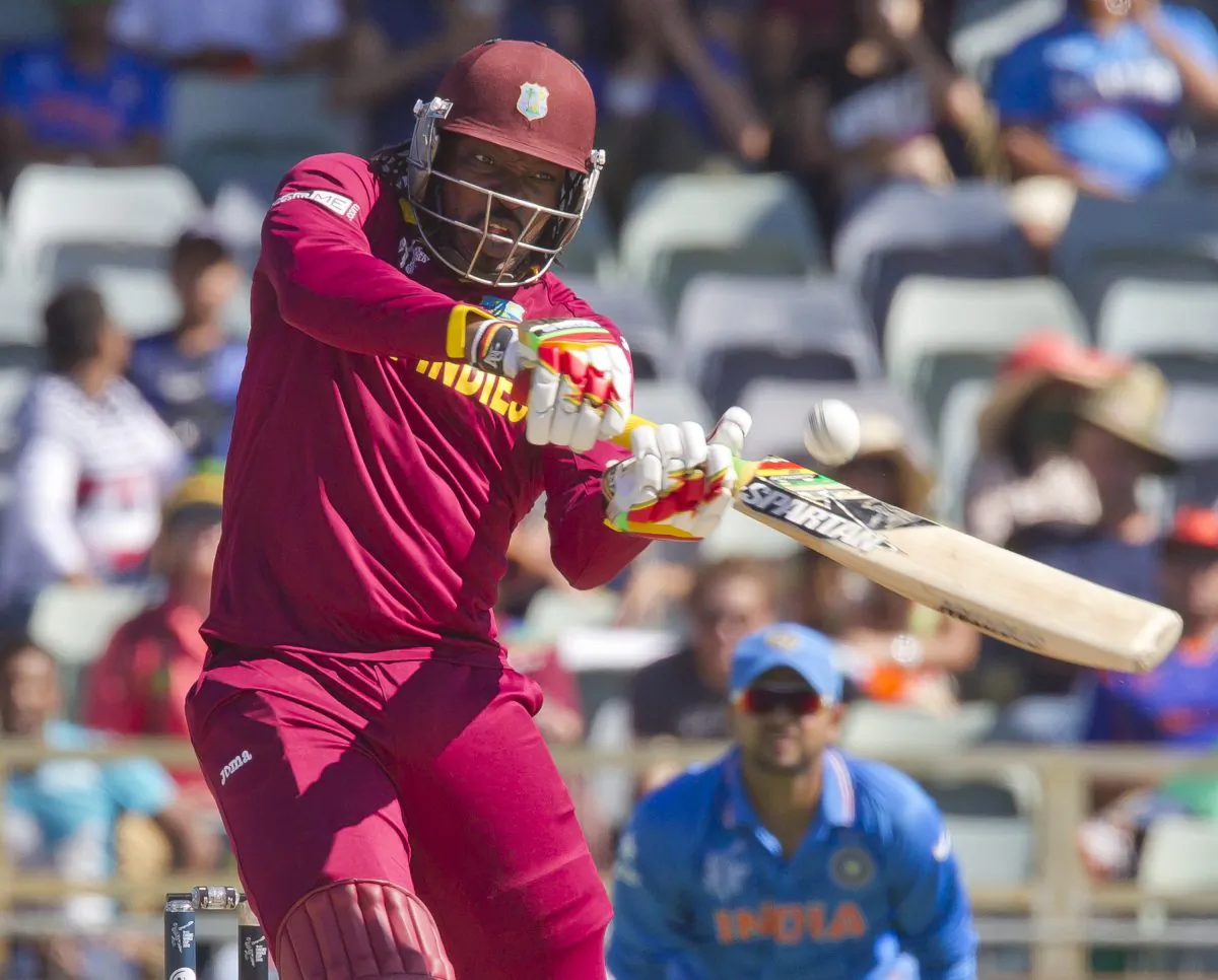 West Indies batsman Chris Gayle plays a shot during the 2015 Cricket World Cup Pool B match between the West Indies and India in Perth on March 6, 2015. (AFP/Tony Ashby) 