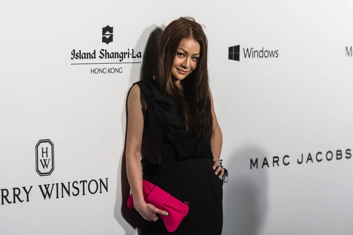 Leung Chai-yan, 23, daughter of Hong Kong Chief Executive Leung Chun-ying poses on the red carpet during the 2015 amfAR Hong Kong gala at Shaw Studios in Hong Kong on Mar. 14, 2015. (Anthony Wallace/AFP/Getty Images)