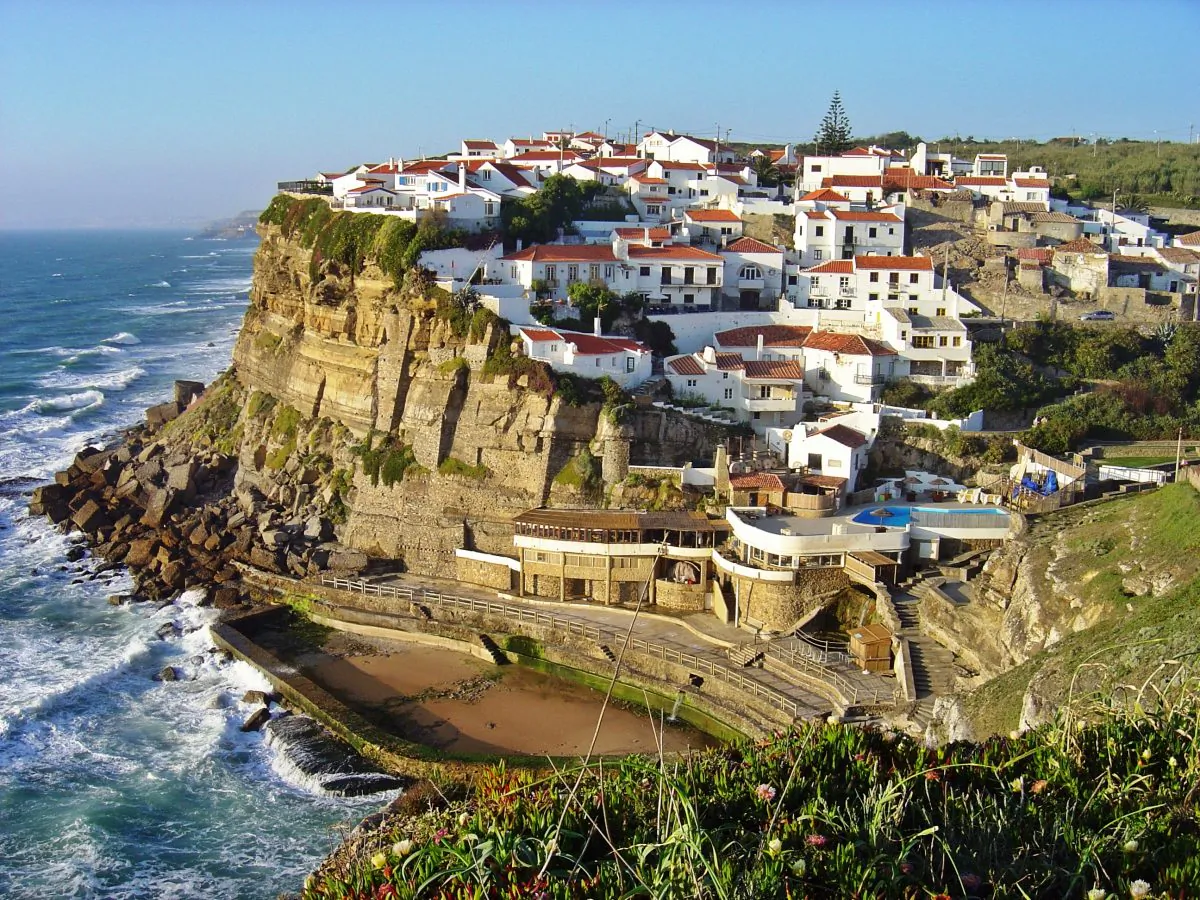 Azenhas do Mar, a seaside town in the municipality of Sintra, Portugal. A minimum investment of €500,000 in real estate is required to obtain a residency visa in Portugal. (
Husond/Wikimedia Commons/CC BY-SA 3.0)