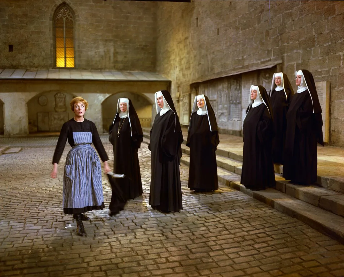 Julie Andrews (L) as Maria, and a group of nuns, in a scene during the song "Maria" from the film, "The Sound of Music." The 1965 Oscar-winning film adaptation of the Rodgers & Hammerstein musical "The Sound of Music" is celebrating its 50th birthday. Tthe film will be screened at the TCM Classic Film Festival in Hollywood later this month and to over 500 movie theaters in April. (AP Photo/Twentieth Century Fox Home Entertainment)