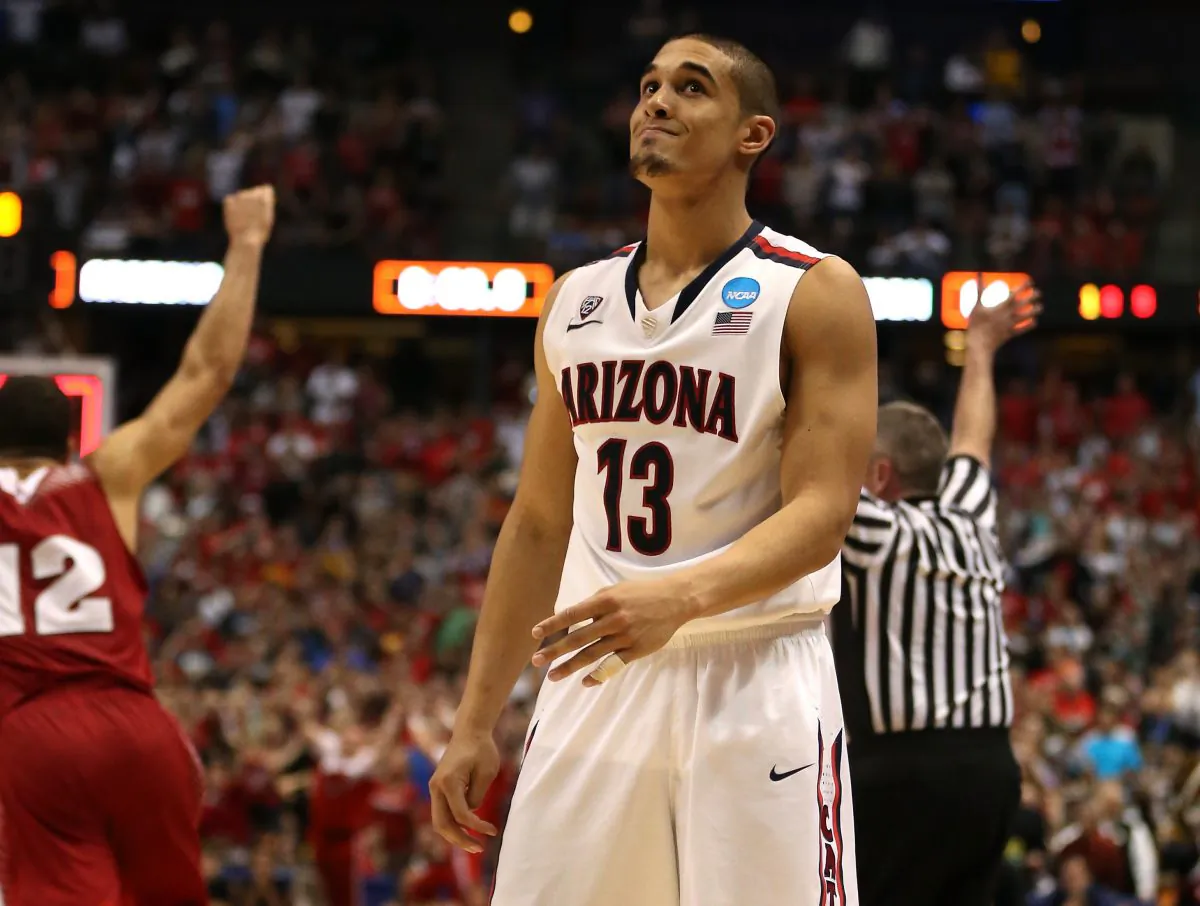 Nick Johnson of the Arizona Wildcats reacts after missing a last-second shot in overtime during his team's loss to the Wisconsin Badgers 64–63 during the West Regional Final on March 29, 2014 in Anaheim, California. (Jeff Gross/Getty Images) 