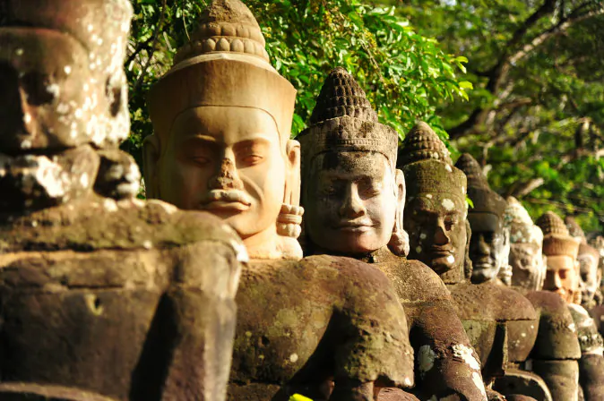 Giants in Front Gate of Angkor Thom via Shutterstock*