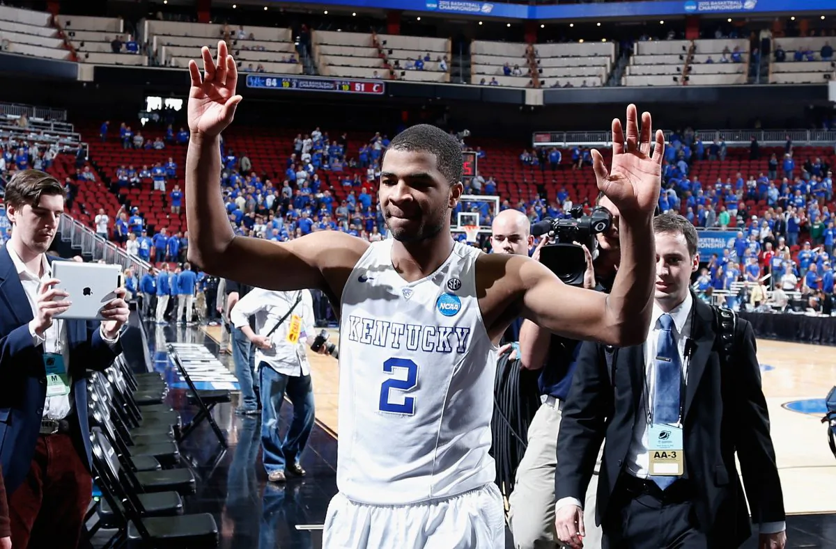 Aaron Harrison and the 36–0 Kentucky Wildcats are prohibitive favorites to win the title. (Joe Robbins/Getty Images) 
