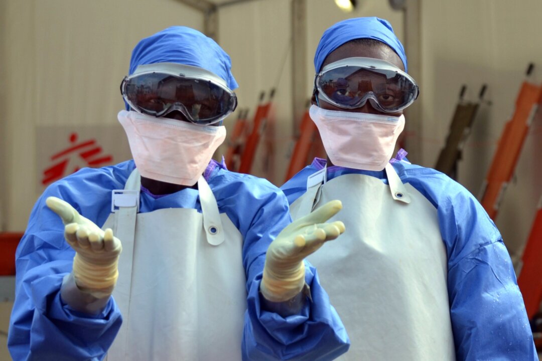 Liberian health workers at an Ebola treatment center in Monrovia, on October 18, 2014. (Zoom Dosso/AFP/Getty Images)