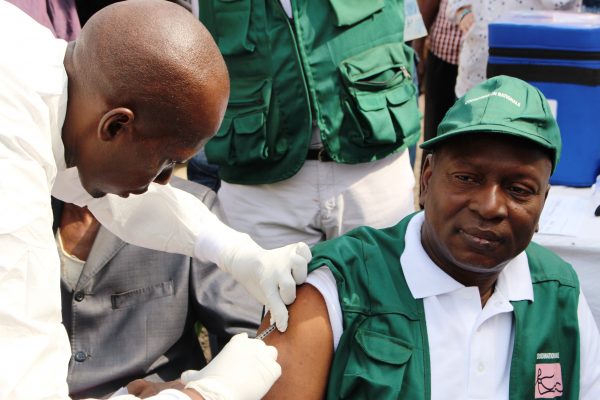 A man gets vaccinated against the Ebola virus at a health center in Conakry, Guinea on March 10, 2015. (CELLOU BINANI/AFP/Getty Images)