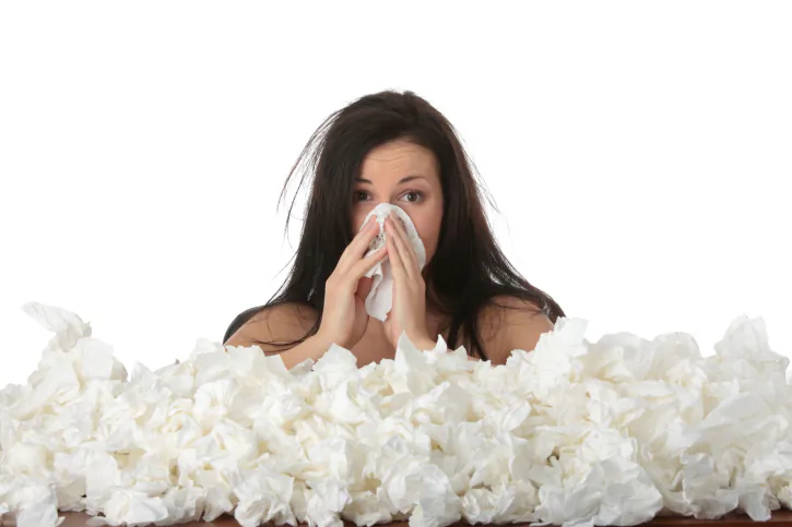 Mucus increases when we get sick, because the proteins in snot help pull invasive germs, viruses, and bacteria out of the body. (iStock/Piotr Marcinski)