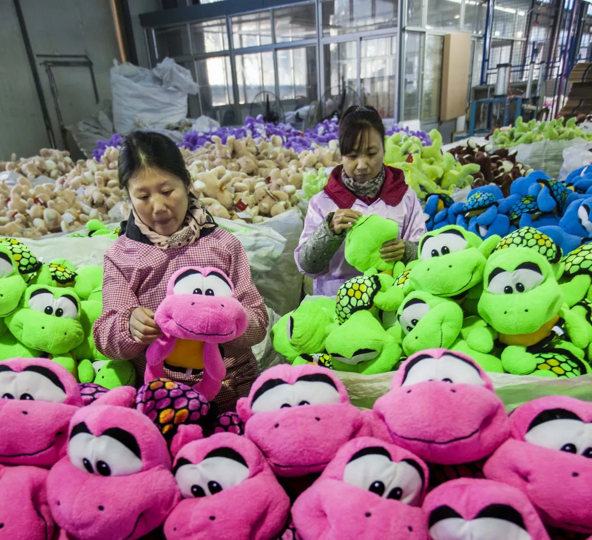Workers manufacture toys for overseas export in Lianyungang, Jiangsu Province, China, on Dec. 8, 2014. (ChinaFotoPress via Getty Images)
