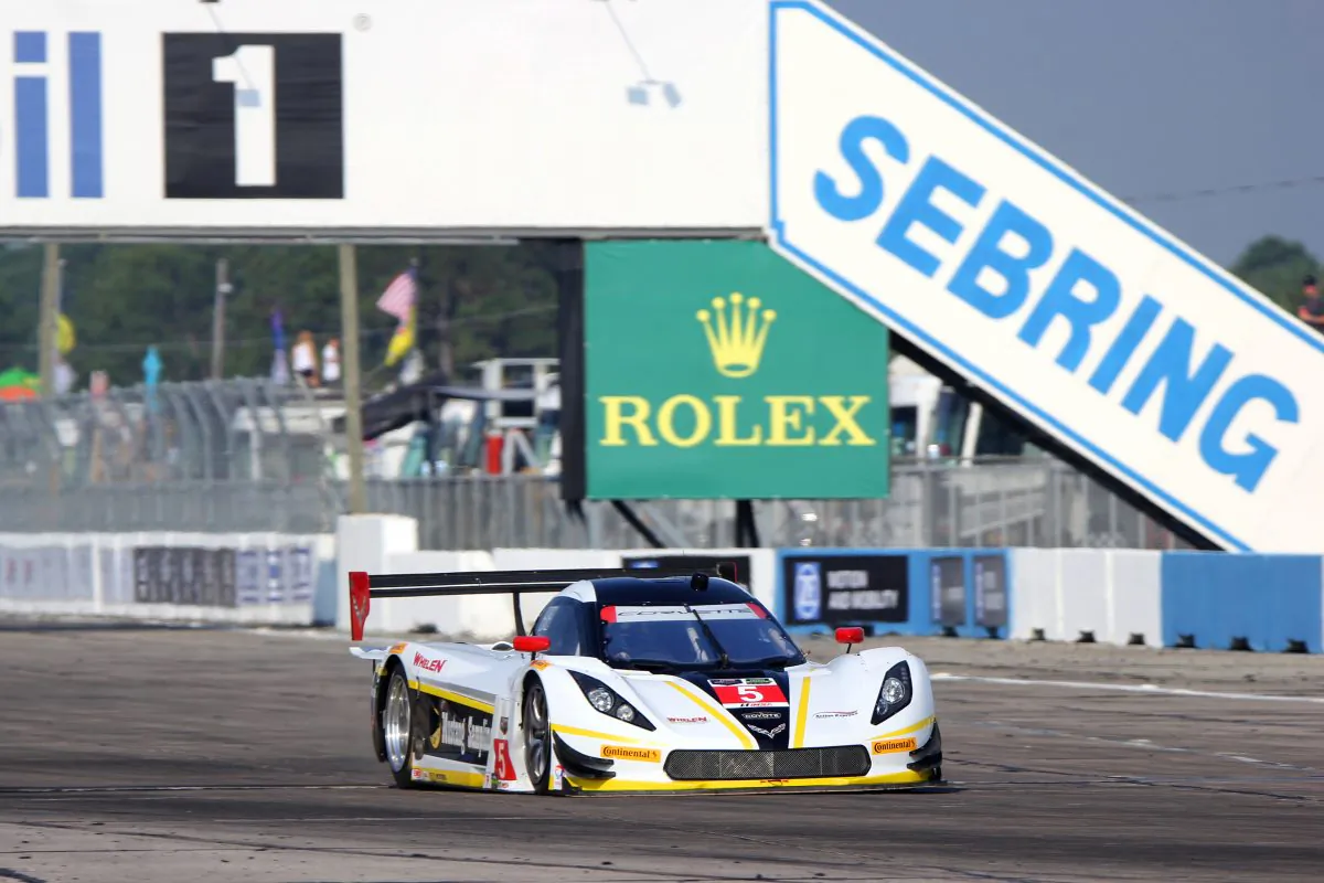 The eventual race winner, the #5 Action express racing Coyote-Corvette, streaks down the front straight early in the Tudor United SportsCar Championship 63rd 12 Hours of Sebring, March 21, 2015. (Chris Jasurek/Epoch Times)