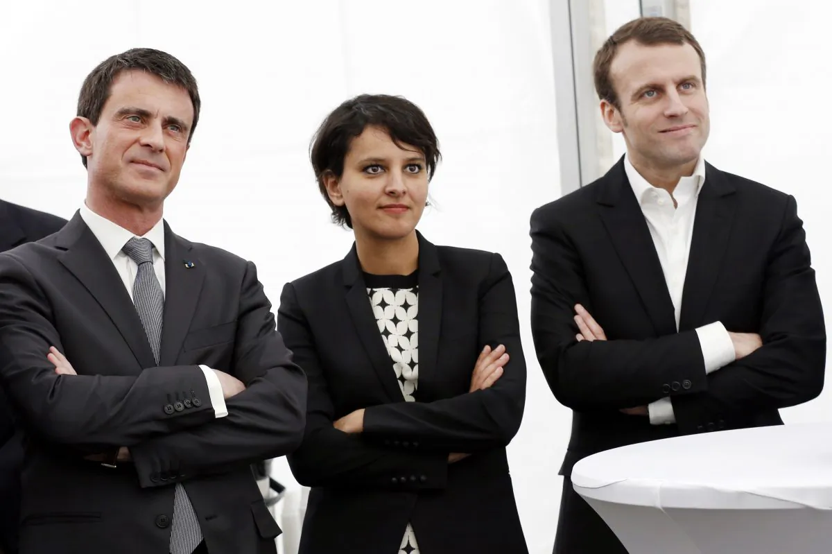 French Prime Minister Manuel Valls (L), French Economy and Industry minister Emmanuel Macron (R), and French Minister of Education Najat Vallaud-Belkacem in Bourg-Saint-Andeol, eastern France, as part of the campaign for the upcoming departmental elections, on March 20, 2015. (Philippe Merle/AFP/Getty Images)